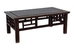 A SMALL RECTANGULAR COFFEE TABLE