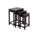 A SET OF THREE HARDWOOD NESTING TABLES