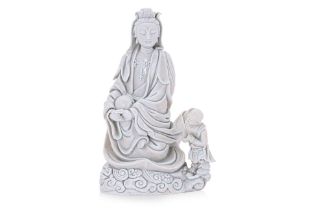 A DEHUA BLANC DE CHINE PORCELAIN FIGURE OF GUANYIN