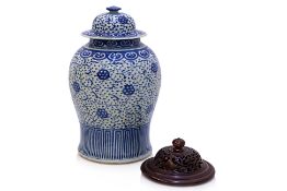 A BLUE AND WHITE LOTUS TEMPLE JAR AND COVER