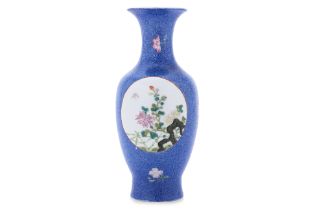 A BLUE SGRAFITTO GROUND FAMILLE ROSE BALUSTER VASE