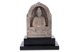 A GANDHARAN SEATED BUDDHA STONE RELIEF