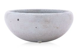 A CRACKLE GLAZED PORCELAIN ALMS BOWL