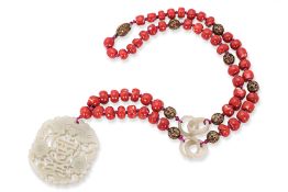 A CARVED JADE AND CORAL BEAD NECKLACE