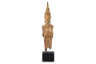 A LAOTIAN STANDING BUDDHA FIGURINE