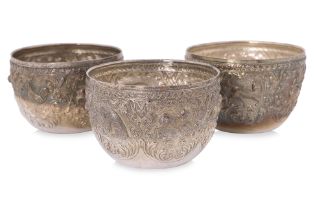 A SET OF THREE BURMESE SILVER BOWLS