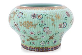 A FAMILLE ROSE CELADON GROUND PORCELAIN JAR