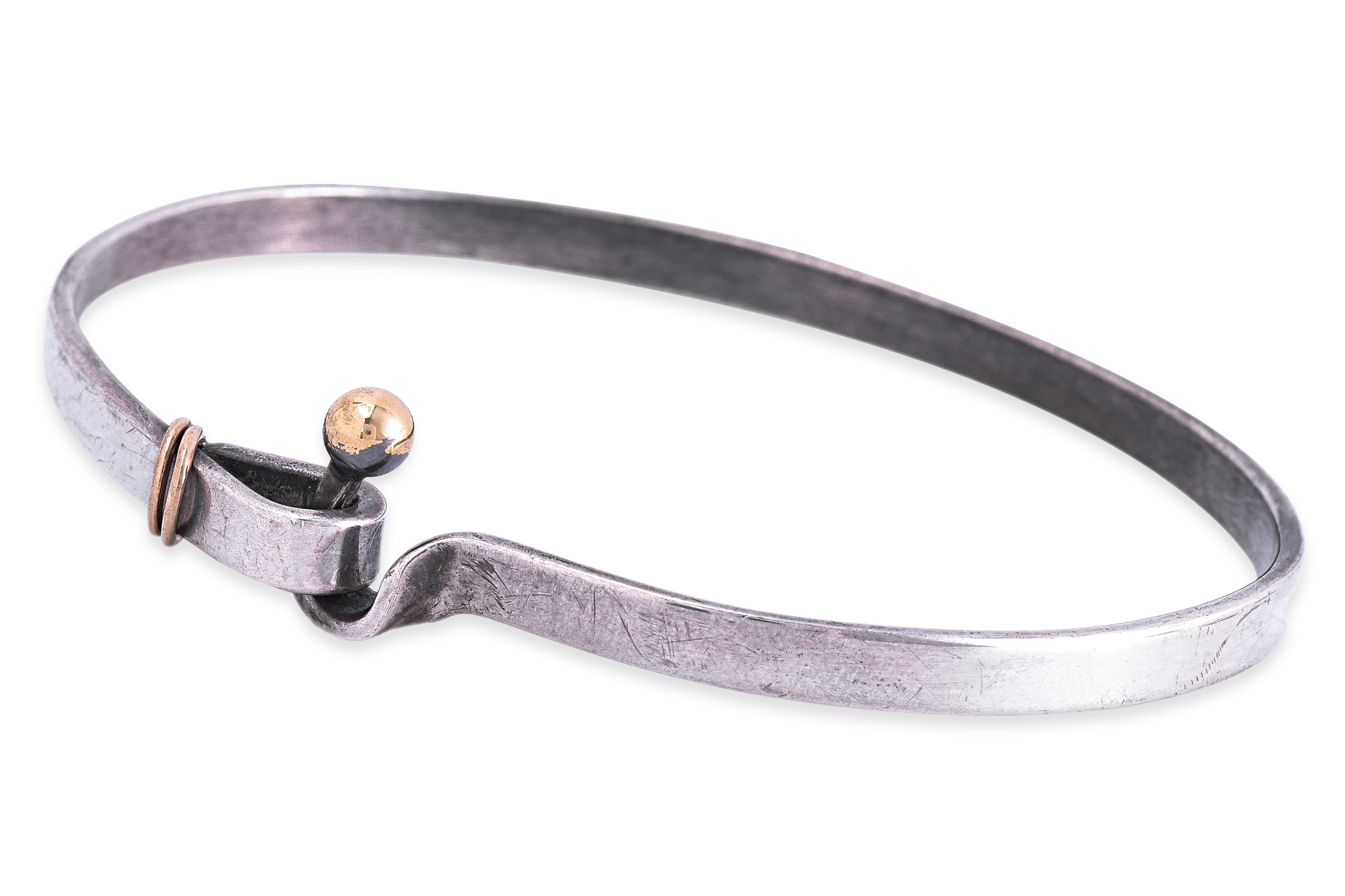 A TIFFANY & CO. SILVER AND GOLD HOOK AND EYE BANGLE BRACELET
