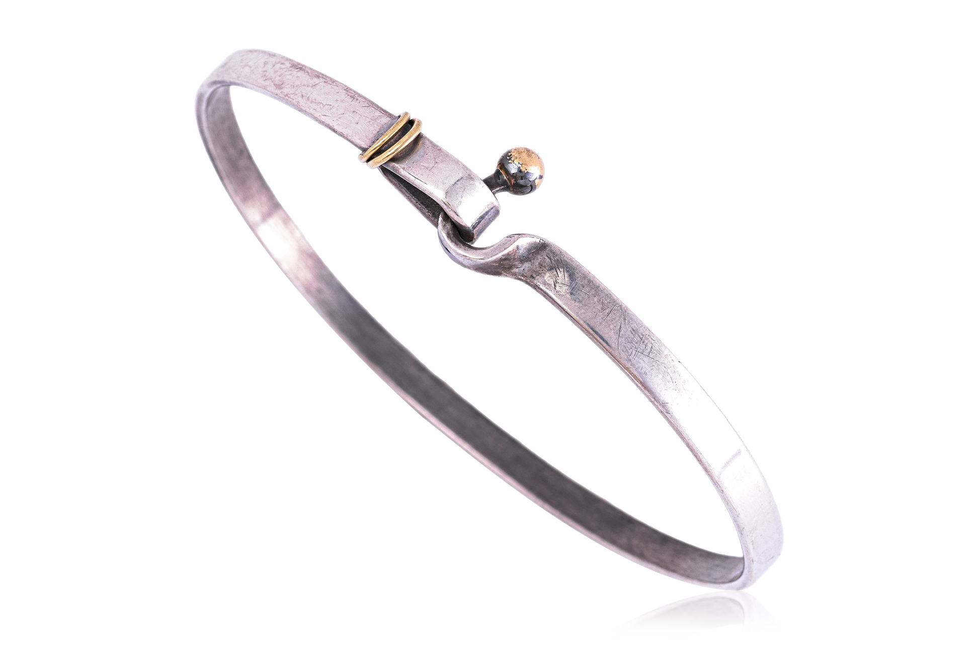 A TIFFANY & CO. SILVER AND GOLD HOOK AND EYE BANGLE BRACELET - Image 2 of 2