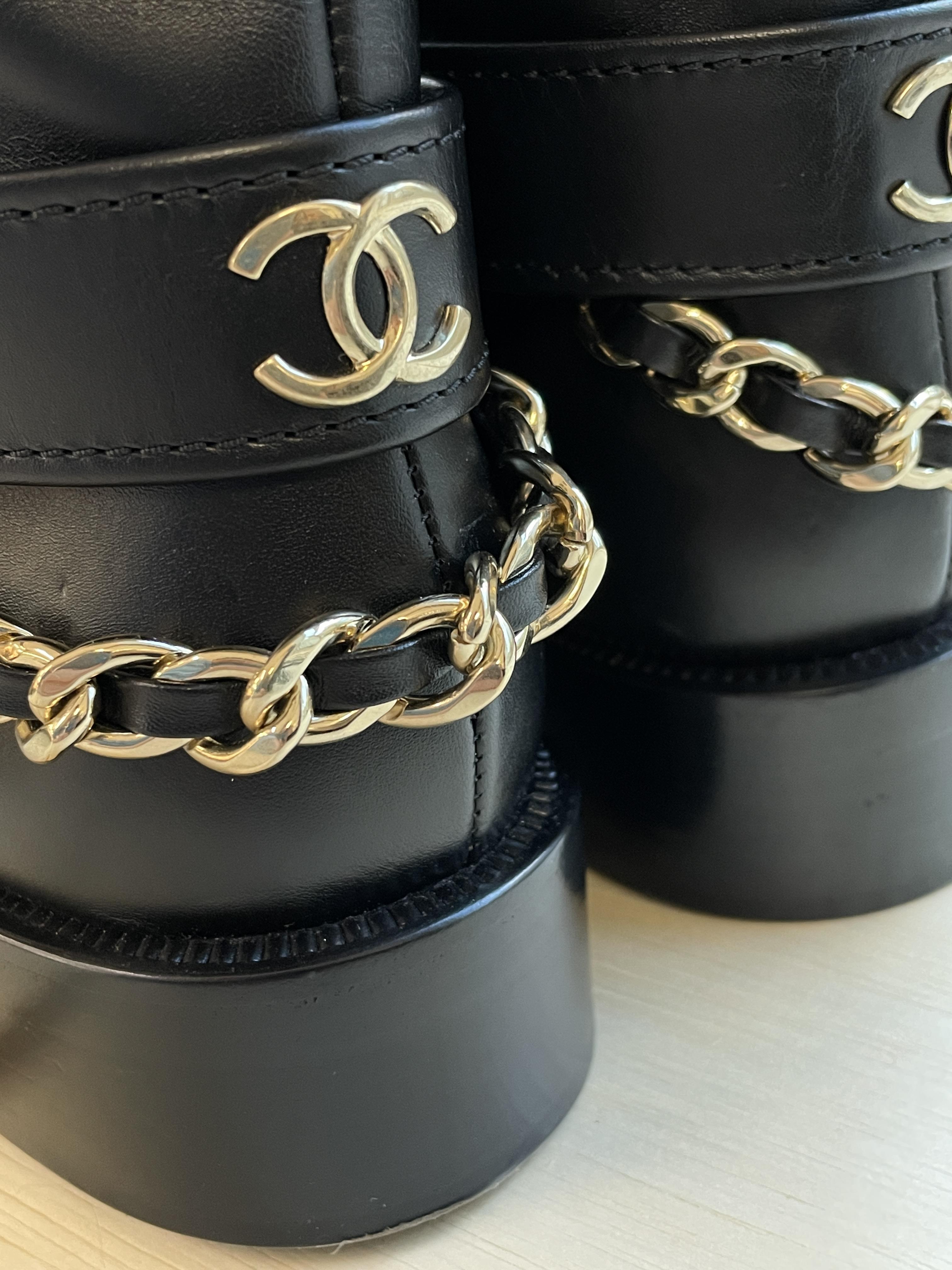 A PAIR OF CHANEL LEATHER ANKLE MOTO BOOTS - Image 6 of 12