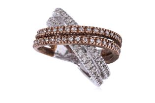 A DIAMOND TWO TONE CROSSOVER RING