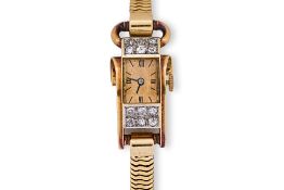 A DIAMOND AND GOLD COCKTAIL WATCH