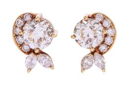 A PAIR OF DIAMOND STUD EARRINGS