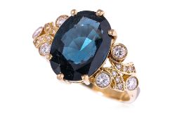 A BLUE SPINEL AND DIAMOND RING