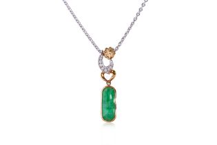 A JADE AND DIAMOND PENDANT ON CHAIN