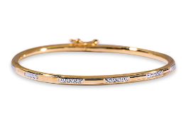 A HIGH CARAT GOLD CHILD'S BANGLE BY POH HENG
