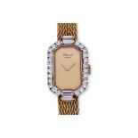 A CHOPARD LADIES GOLD AND DIAMOND COCKTAIL WATCH