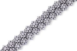 A DIAMOND 'SNOWFLAKE' WHITE GOLD BRACELET