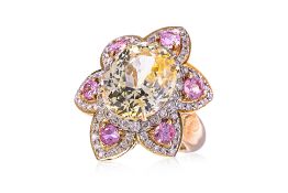 A LARGE YELLOW SAPPHIRE, PINK SAPPHIRE AND DIAMOND RING