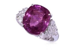 A LARGE UNHEATED PINK SAPPHIRE AND DIAMOND RING