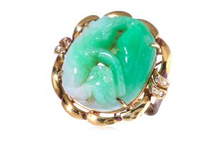 A TYPE A JADEITE CARVING AND DIAMOND RING