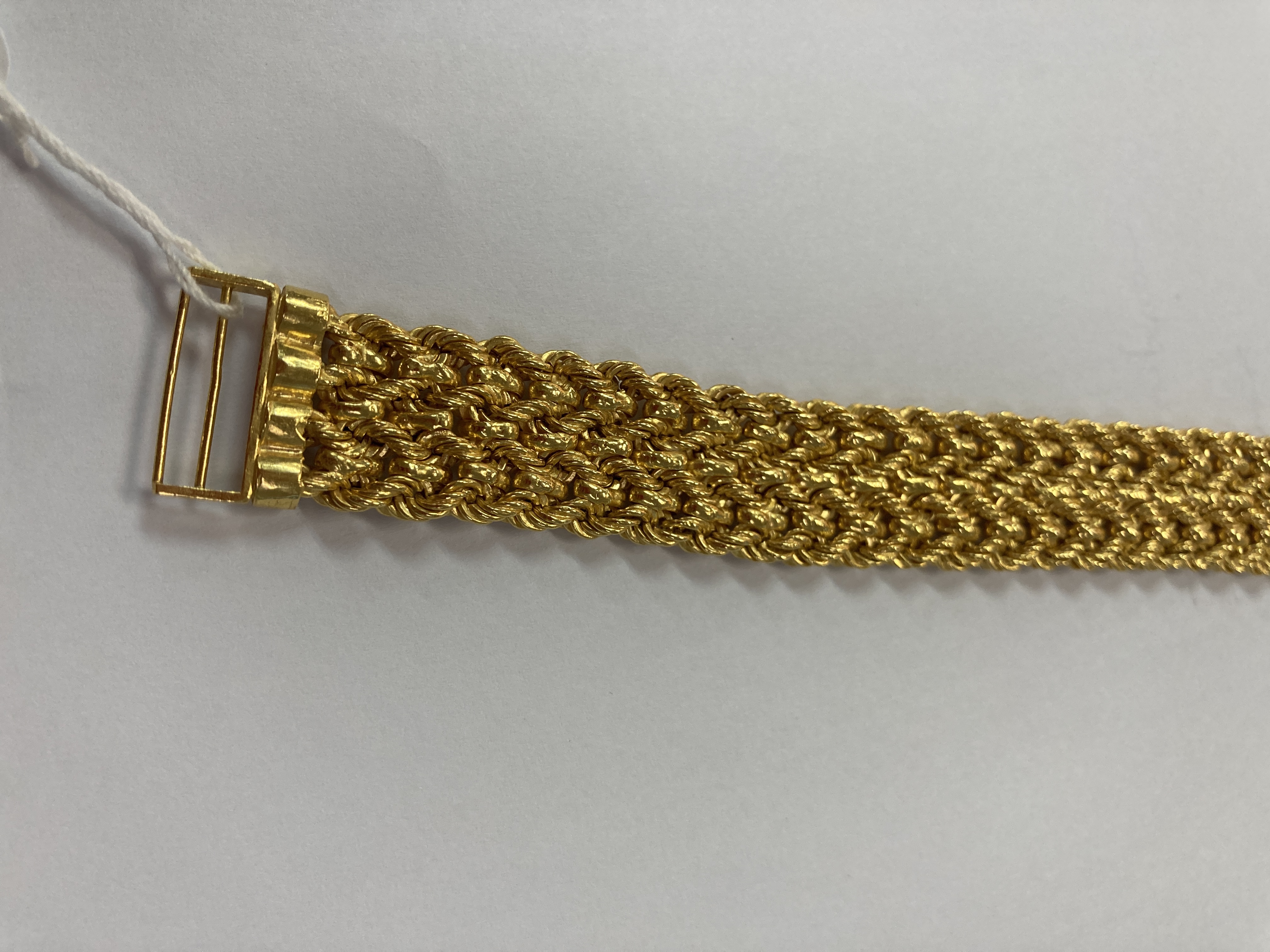 A HIGH CARAT BRAIDED GOLD BRACELET - Image 7 of 10