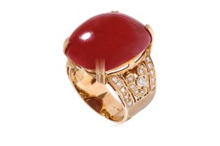 A LARGE RED CORAL AND DIAMOND RING