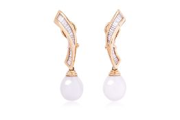 A PAIR OF CULTURED SOUTH SEA PEARL AND DIAMOND CLIP EARRINGS