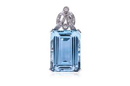 A VERY LARGE BLUE TOPAZ AND DIAMOND ART DECO STYLE PENDANT