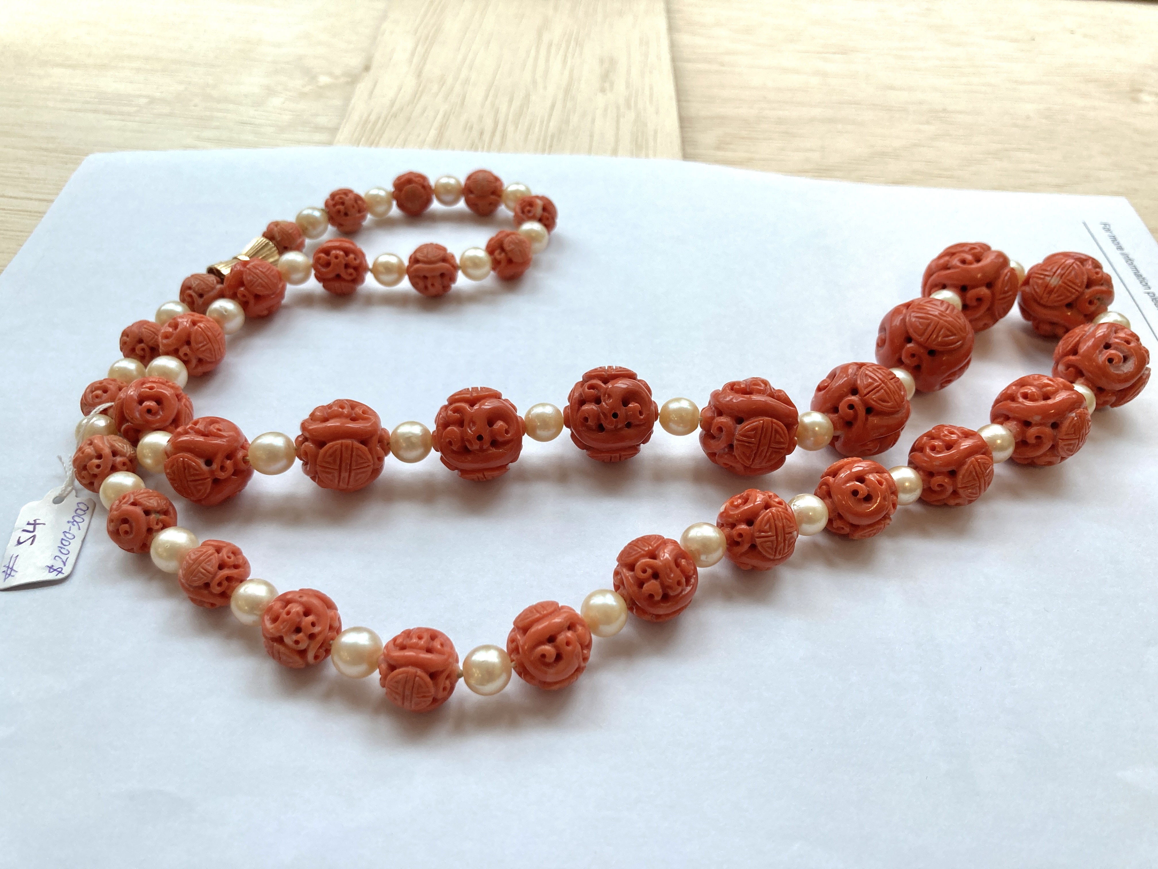 A LONG CARVED CORAL AND CULTURED PEARL NECKLACE - Image 5 of 9