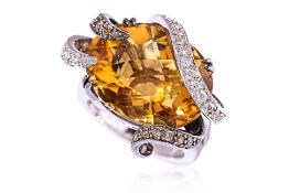 A LARGE CITRINE, 'CHAMPAGNE' DIAMOND AND DIAMOND RING