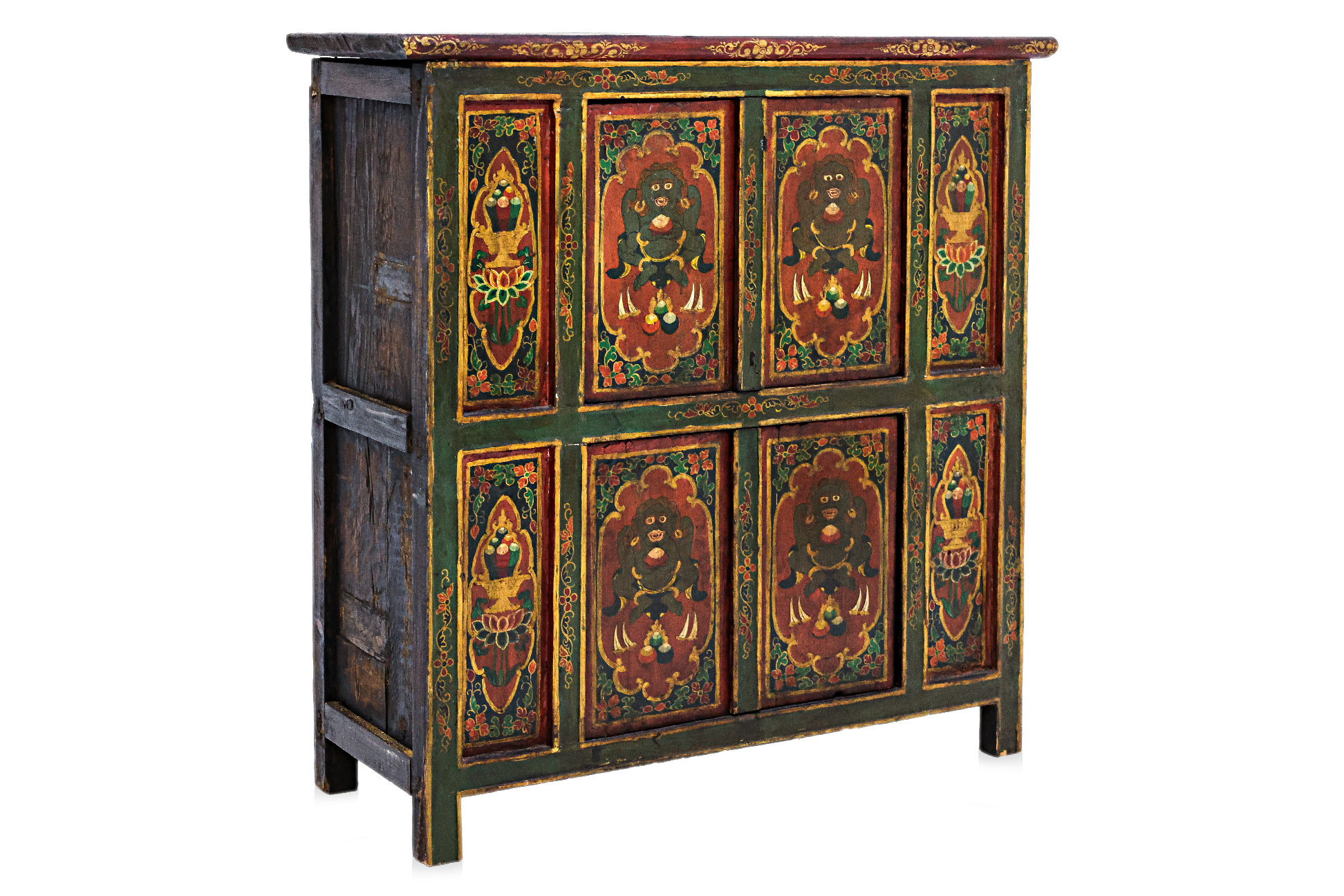 A TIBETAN RED AND GREEN GESSO CABINET