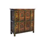 A TIBETAN RED AND GREEN GESSO CABINET