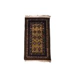 AN ANATOLIAN STYLE WOOL RUG