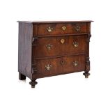 AN ANTIQUE EUROPEAN CHEST OF DRAWERS