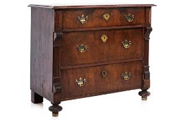 AN ANTIQUE EUROPEAN CHEST OF DRAWERS
