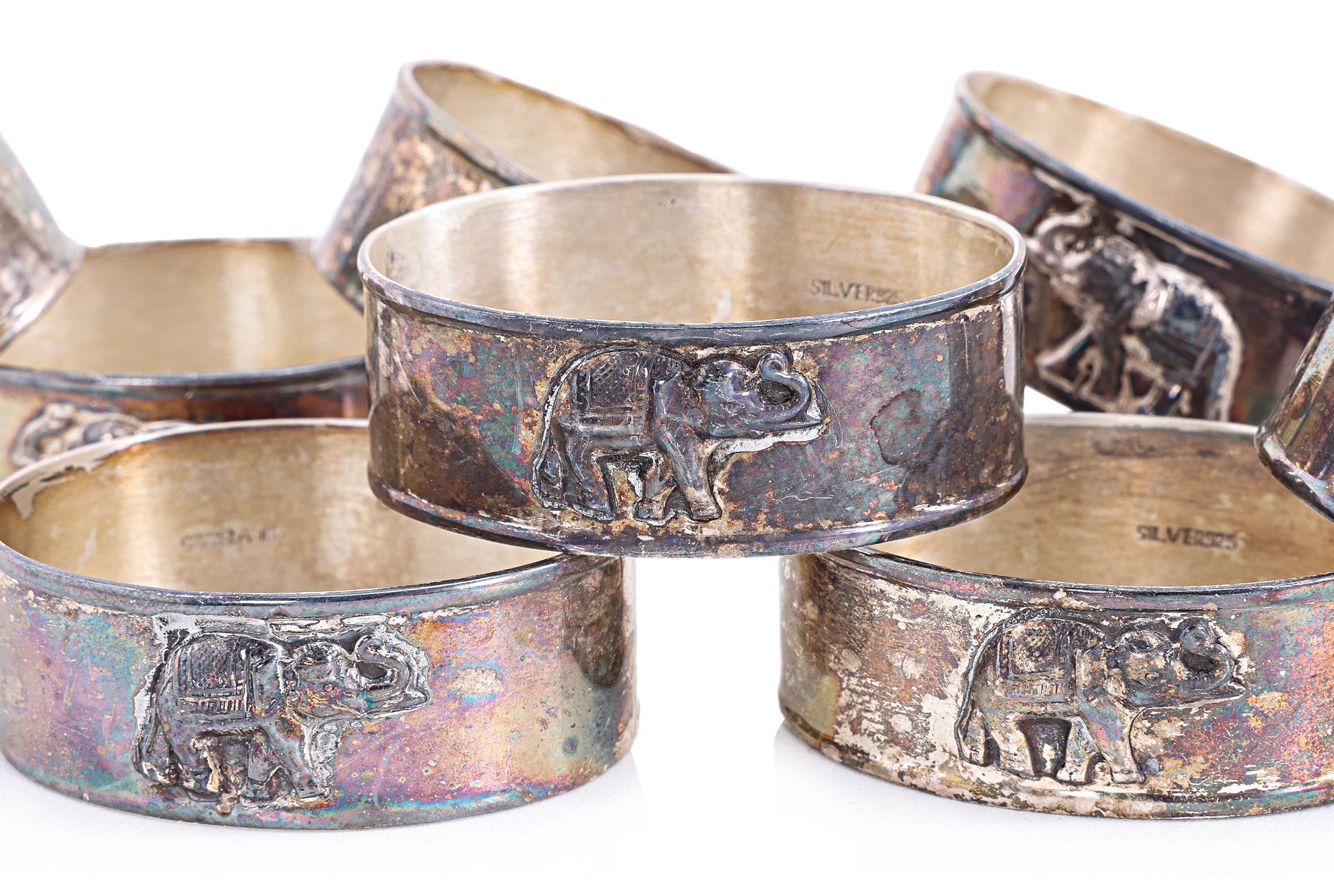 A SET OF EIGHT ELEPHANT DECORATED SILVER NAPKIN RINGS - Image 2 of 2