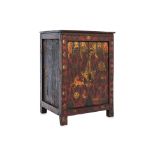 A TIBETAN RED GESSO CABINET