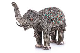 A NEPALESE FILIGREE MODEL OF AN ELEPHANT