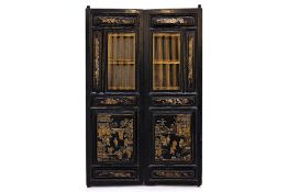 A PAIR OF CHINESE LACQUERED DOORS