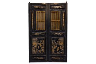 A PAIR OF CHINESE LACQUERED DOORS