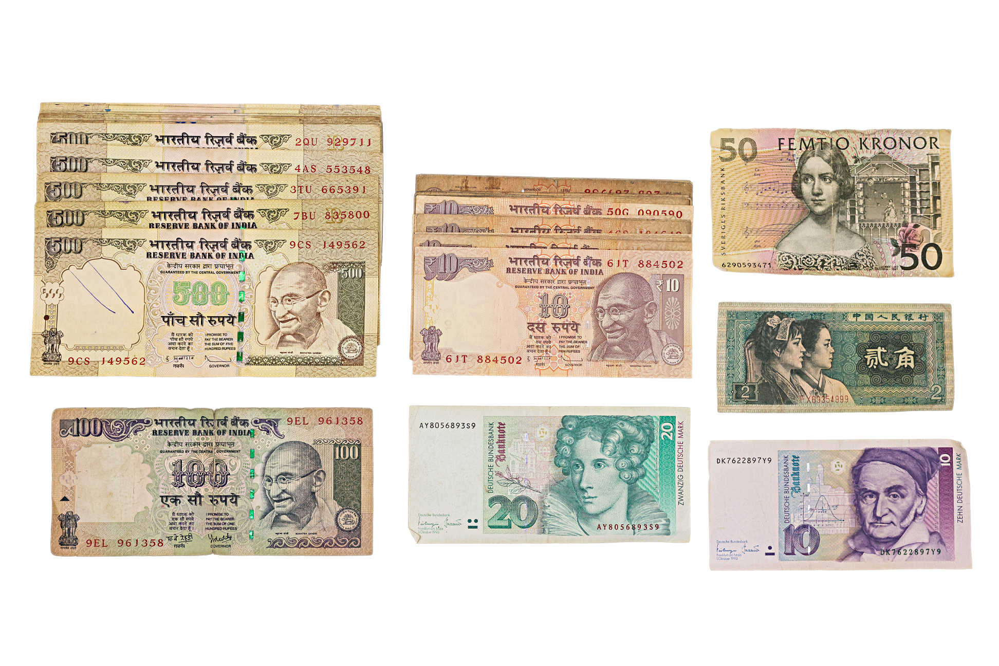 A GROUP OF BANKNOTES INCLUDING RUPEES, KRONOR & MARKS