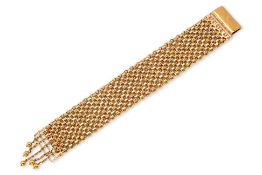 A HIGH KARAT WIDE GOLD BRACELET