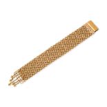 A HIGH KARAT WIDE GOLD BRACELET