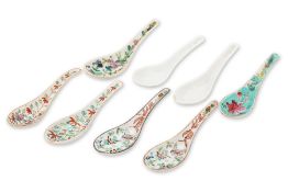 AN ASSORTED GROUP OF FAMILLE ROSE SPOONS AND TWO OTHERS