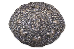 A REPOUSSE SILVER BELT BUCKLE