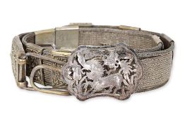 A SILVER BELT AND BUCKLE