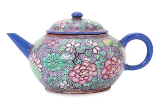 AN ENAMELLED YIXING PEONY AND BUTTERFLY TEAPOT