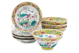 A SET OF FOUR 'IN & OUT' FAMILLE ROSE TEA BOWLS AND SAUCERS