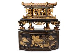 A CARVED GILT AND BLACK LACQUER CHANAB